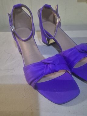 Knot-Front Ankle-Strap Block Heels in Vibrant Purple.   Box 40